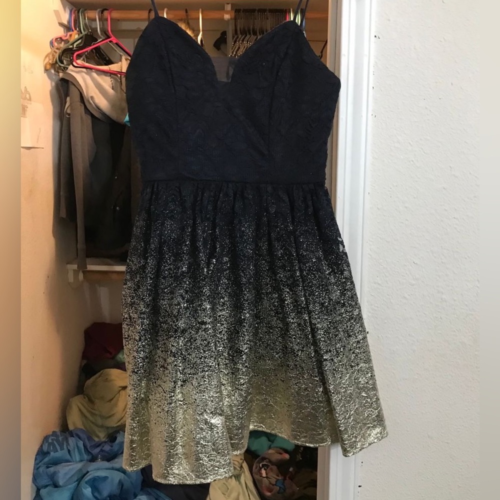 B. Darlin navy blue with gold ombré mini dress.